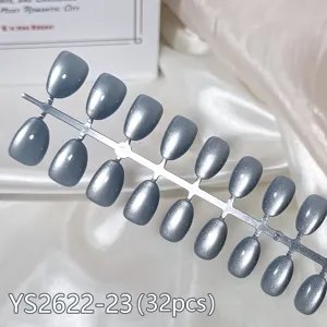 Close-up detail of silver cat eye press-on nails display set, smooth metallic aurora finish.