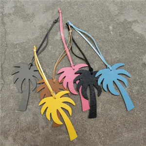 Colorful palm tree leather bag charm, chic handbag pendant and stylish car accessory.