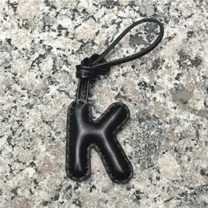 Black leather letter K bag charm initial pendant stylish accessory for handbags and car keys