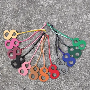Colorful number 8 leather bag charm pendant accessory for DIY fashion decoration and gifts.