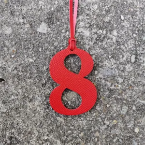 Red leather number 8 bag charm DIY pendant lucky numeric accessory for handbags and purses.