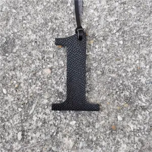 Black leather texture number 1 bag charm DIY numerical pendant accessory detail view