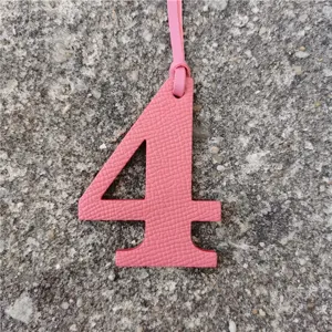 Pink leather number 4 bag charm DIY pendant accessory for stylish handbags and purses.
