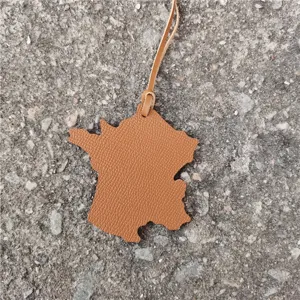 Leather France map charm for handbag pendant and car hanging decoration, stylish accessory.