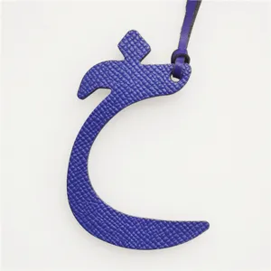 Blue leather Arabic letter bag charm and stylish keychain ornament for women and girls handbag.