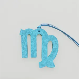 Blue leather Virgo zodiac bag charm, elegant car hanging ornament with fine leather strap.