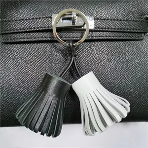 Two-tone leather tassel bag charm keyring stylish dual color purse accessory for women