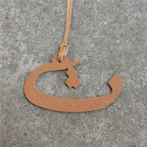 Arabic letter leather bag charm, stylish car hanging ornament and purse accessory.