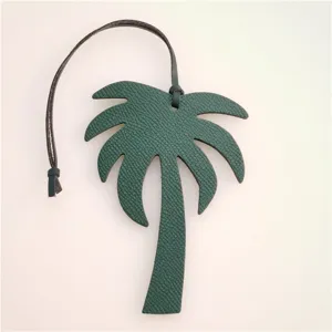 Green leather palm tree bag charm, stylish purse pendant and chic car hanging accessory.