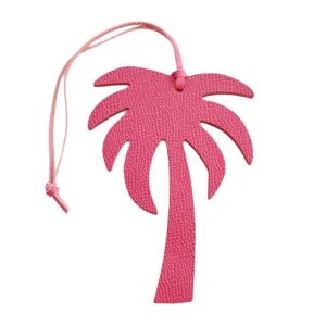 Pink leather palm tree bag charm, stylish tropical car pendant and cute handbag accessory.