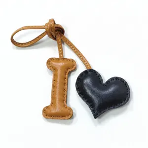 Handmade leather letter I and heart bag charm, cute keychain and car hanging accessory.