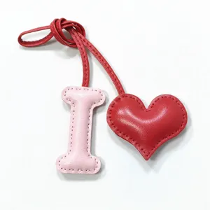 Leather letter I and red heart charm pendant, hand-stitched bag accessory for daily style.
