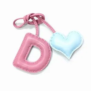 Handmade leather letter D and heart bag charm, cute pink and blue keychain pendant for women handbags.