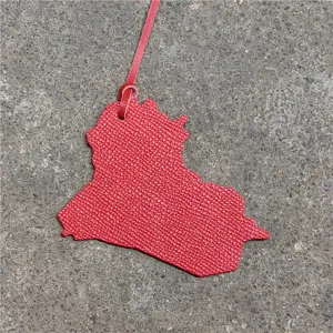 Red leather map shape bag charm, unique purse accessory and stylish keychain pendant.