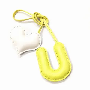 Handgefertigter Leder U Buchstabe Herz Tasche Anhänger, gelbe weiße Handtasche Deko Accessoire.