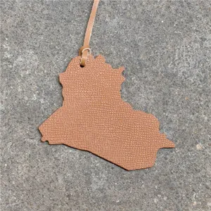 Leather map pendant bag charm, stylish country shape handbag accessory for daily use now.