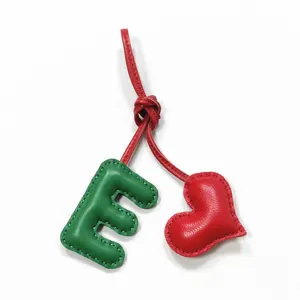Handmade leather letter E and red heart bag charm pendant for women handbag and car accessories.