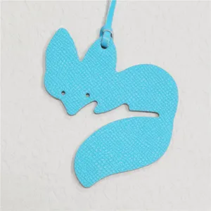 Light blue leather fox bag charm cute animal keychain stylish handbag accessory for women.