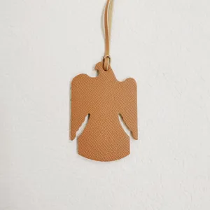 Colgante de bolso de águila de cuero marrón elegante accesorio colgante para interior de auto