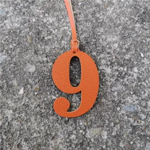 Orange leather number 9 bag charm DIY pendant accessory for handbag decoration style.