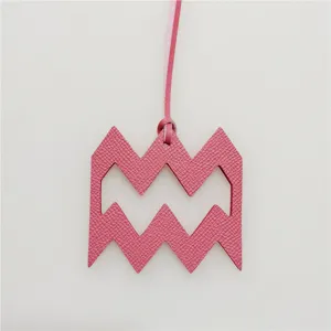 Pink leather Aquarius zodiac charm pendant stylish bag accessory for women daily wear