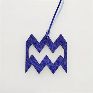 Blue leather zodiac charm Aquarius astrology pendant stylish bag accessory for women