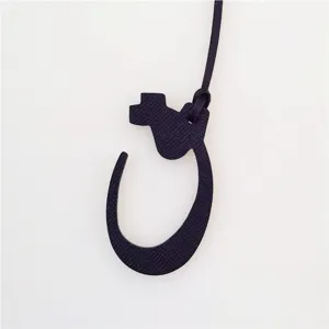 Arabic letter leather bag charm, elegant dark embossed leather keychain for purses and handbags.