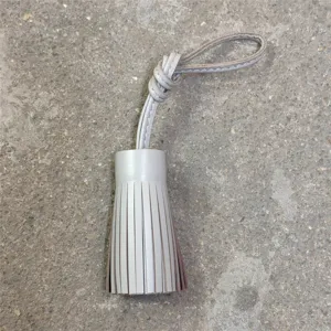 Grey genuine leather tassel bag charm, handmade leather rearview mirror hanging pendant.