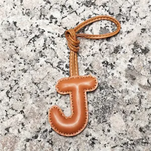Light brown leather letter J bag charm, premium lambskin initial pendant for purses and car keys.