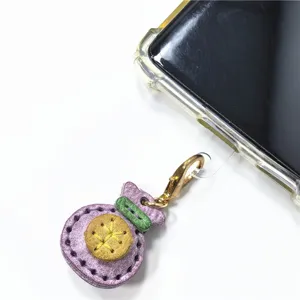 Colgante de teléfono de cuero genuino hecho a mano, bonito accesorio de bolso y llavero.