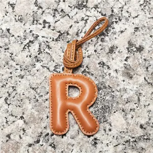 Light brown leather letter R bag charm, initial keychain pendant for women handbags & car decor.