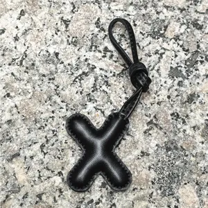 Black leather letter X bag charm initial pendant keyring cute purse accessory for women gifts.