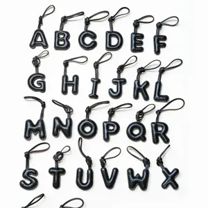 Black leather alphabet letter bag charm, stylish puffy initial keychain for women and car.