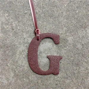 Leather uppercase letter G bag charm accessory, stylish monogram keychain pendant for women handbags.