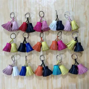 Colorful two-tone leather tassel keychain bag charm, cute car key ring pendant accessory.