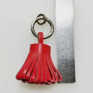 Cuero genuino rojo borla bolso encanto miniatura llavero accesorio con anillo metálico