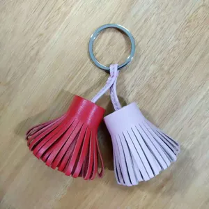 Double color leather tassel keychain cute bag charm car key ring stylish fashion accessory.