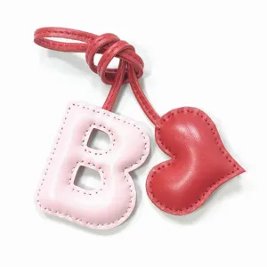 Llavero con Colgante de Bolso de Cuero Genuino Cosido a Mano con Letra B y Corazón para Mujer Accesorio de Coche