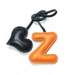 Handmade leather letter Z and heart bag charm with contrast stitching for women handbags.