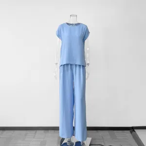 Light blue two-piece casual shirt and wide-leg pants set, stylish and comfortable outfit.