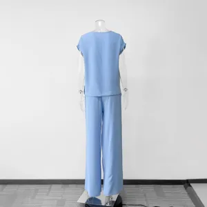 Light blue casual two-piece set for women, featuring a loose short-sleeve top and wide-leg pants.