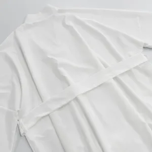 Solid color white long sleeve cardigan lounger detail view, soft and comfortable fabric.
