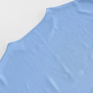 Light blue shirt collar detail, premium soft fabric texture close-up view for women's top.