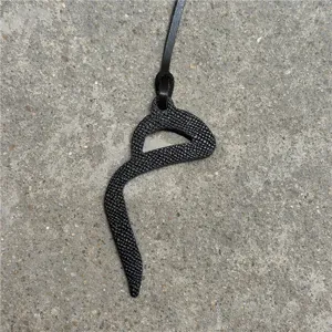 Black leather Arabic letter bag charm stylish purse pendant car hanging accessory.