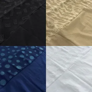 Vue de détail de tissu montrant des motifs texturés et des coutures en quatre coloris.