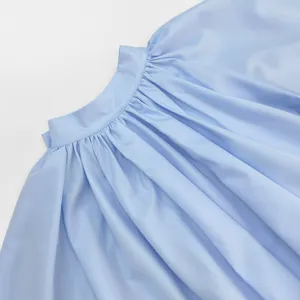 Exquisite light blue blouse collar and delicate pleated fabric texture close up detail