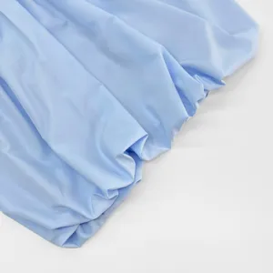 French style light blue shirt fabric detail, smooth texture for women elegant blouse