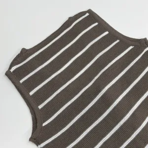 Close up view of a stylish brown and white striped knitted vest, showing fine texture detail.