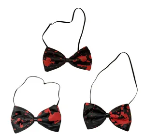 Detailed view of Halloween blood splatter bowties, perfect for scary party costumes and decor.