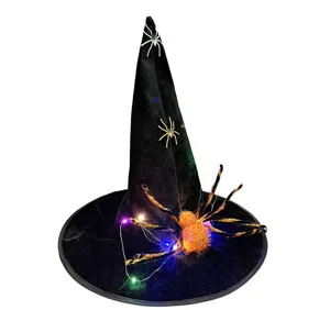 Detailed view of black Halloween witch hat featuring glowing fairy lights and realistic toy spiders.